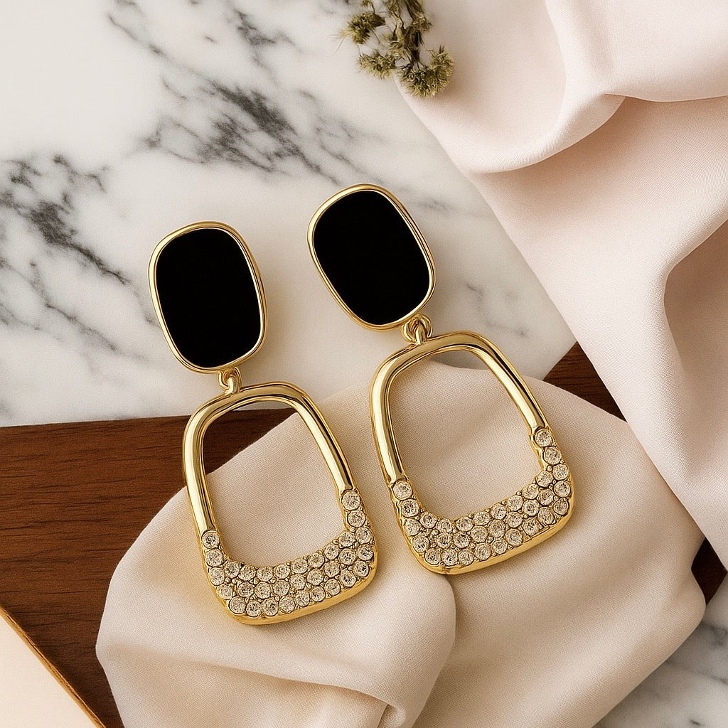 Elegant Lightweight Gold Plated Dangle Earrings With Black Enamel & American Diamonds